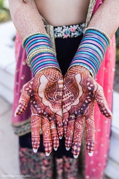 Indian bridal henna art on her hands capture. Indian bridal henna art on her hands capture.