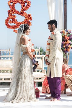 Maharani on her white ceremony lehenga and groom with sherwani. Maharani on her white ceremony lehenga and groom with sherwani.