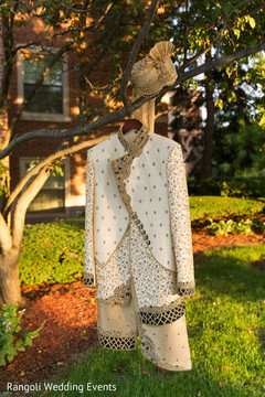Ivory and golden Indian groom wedding ceremony outfit. Ivory and golden Indian groom wedding ceremony outfit.