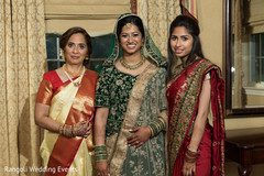 Indian bride with relatives posing on wedding ceremony outfits. Indian bride with relatives posing on wedding ceremony outfits.