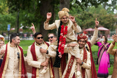 Indian groom lifted by Indian groomsmen. Indian groom lifted by Indian groomsmen.