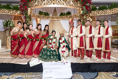 Indian couple posing with groomsmen and bridesmaids. Indian couple posing with groomsmen and bridesmaids.