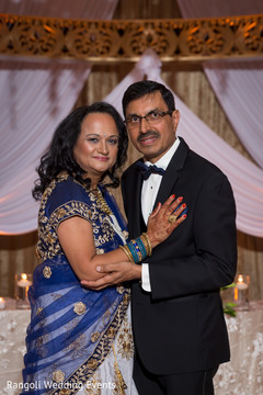 Indian wedding relatives posing on reception outfits. Indian wedding relatives posing on reception outfits.