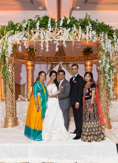 Maharani and raja posing with bridal relatives. Maharani and raja posing with bridal relatives.