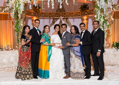 Indian couple with relatives reception photo session. Indian couple with relatives reception photo session.