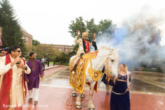 Indian groom riding his white baraat horse. Indian groom riding his white baraat horse.