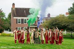 Indian couple posing outdoors with bridesmaids and groomsmen. Indian couple posing outdoors with bridesmaids and groomsmen.