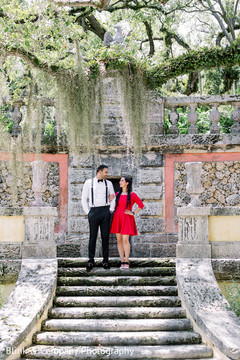 Indian bride and groom posing on stairs. Indian bride and groom posing on stairs.