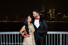 Indian couple on their elegant wedding reception outfits. Indian couple on their elegant wedding reception outfits.