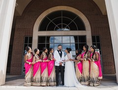 Glamorous indian couple with bridesmaids photo session. Glamorous indian couple with bridesmaids photo session.