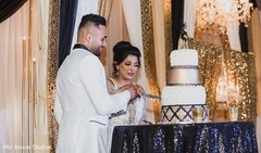 Indian couple cutting cake moment. Indian couple cutting cake moment.