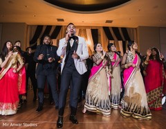 Indian groom dancing with bridesmaids and groomsmen. Indian groom dancing with bridesmaids and groomsmen.