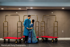Indian couple looking at each other on a hall Indian couple looking at each other on a hall