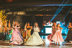 Female Indian relatives performing a choreography Female Indian relatives performing a choreography