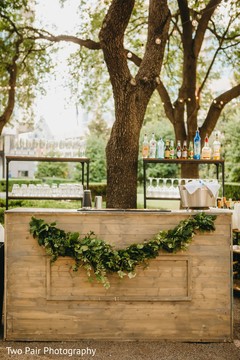 Indian wedding wooden outdoors drinks bar. Indian wedding wooden outdoors drinks bar.