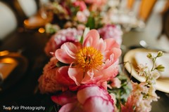 Yellow and peach flowers decorations for indian wedding table. Yellow and peach flowers decorations for indian wedding table.