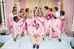 Joyful Indian couple at ceremony photo session. Joyful Indian couple at ceremony photo session.