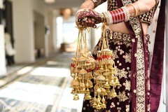 Indian bride red chooras and gold kalire. Indian bride red chooras and gold kalire.