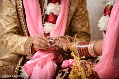 Indian groom putting ring to bride ritual. Indian groom putting ring to bride ritual.
