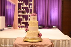 Ivory Indian wedding cake with roses decorations. Ivory Indian wedding cake with roses decorations.