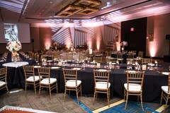 Indian wedding reception black and golden table ware. Indian wedding reception black and golden table ware.