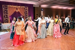 Indian bridesmaids with groomsmen dancing capture. Indian bridesmaids with groomsmen dancing capture.