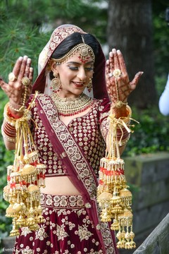 Indian bride on her ceremony lehenga and jewelry. Indian bride on her ceremony lehenga and jewelry.
