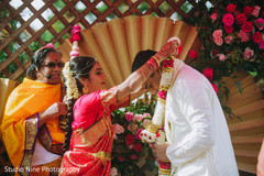 Maharani putting a necklace on her Indian groom Maharani putting a necklace on her Indian groom