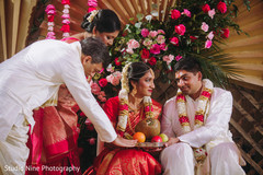 Indian couple being given a platter with fruits Indian couple being given a platter with fruits