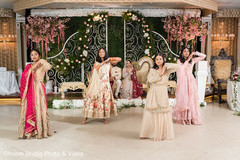 Indian bridesmaids performing a choreography Indian bridesmaids performing a choreography