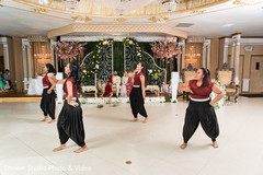 Indian newlyweds watching a choreography Indian newlyweds watching a choreography