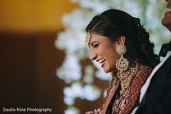 Indian newlyweds laughing together Indian newlyweds laughing together