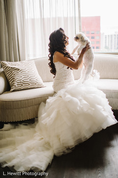 Maharani with her pet on her white wedding mermaid dress. Maharani with her pet on her white wedding mermaid dress.