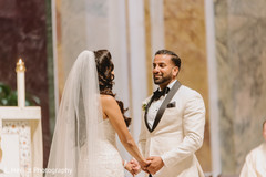 Indian couple holding hands at wedding ceremony. Indian couple holding hands at wedding ceremony.