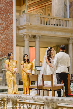 Indian bride and groom admired by bridesmaids. Indian bride and groom admired by bridesmaids.