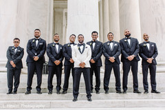 Rajaa and groomsmen posing outdoors capture. Rajaa and groomsmen posing outdoors capture.