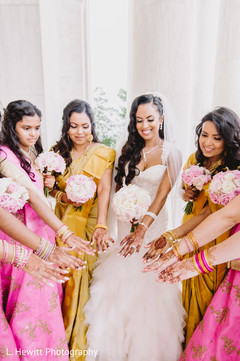 Maharani Indian bridesmaids showing their mehndi art. Maharani Indian bridesmaids showing their mehndi art.
