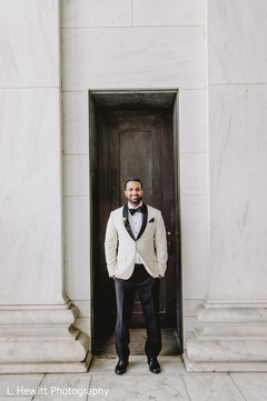 Elegant indian groom on his white and black wedding suit. Elegant indian groom on his white and black wedding suit.