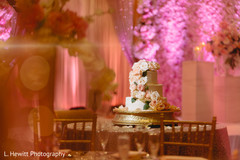 Indian ivory and peach wedding reception cake. Indian ivory and peach wedding reception cake.