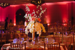 Indian wedding reception table tall flower vase decor. Indian wedding reception table tall flower vase decor.
