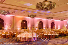 Indian wedding reception venue pink lights decoration. Indian wedding reception venue pink lights decoration.