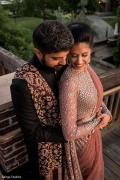 Raja hugging maharani at reception photo session. Raja hugging maharani at reception photo session.