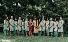 Indian couple with bridesmaids and groomsmen posing outdoors. Indian couple with bridesmaids and groomsmen posing outdoors.