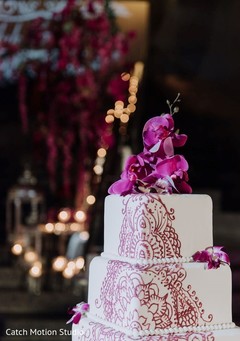 white and magenta indian wedding cake decoration. white and magenta indian wedding cake decoration.
