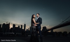 Indian couple posing outdoor on gala suits for photo session Indian couple posing outdoor on gala suits for photo session