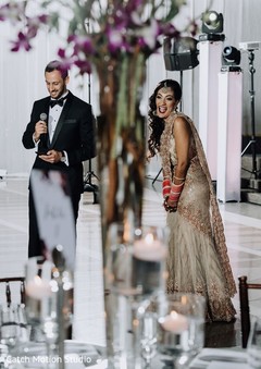 Indian bride and groom giving out reception speech. Indian bride and groom giving out reception speech.