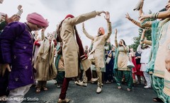 Indian groom dancing at baraat procession. Indian groom dancing at baraat procession.