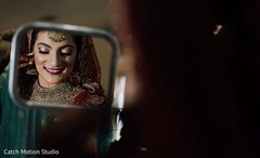 Maharani getting her kundan earrings on capture. Maharani getting her kundan earrings on capture.