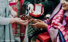 Maharani getting her wedding gold bangles on. Maharani getting her wedding gold bangles on.