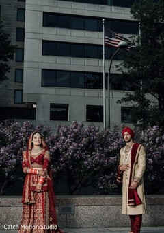 Indian bride and groom posing outdoors. Indian bride and groom posing outdoors.